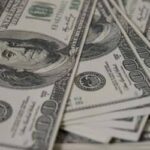 Dólar encerra a quinta-feira praticamente estável, cotado a R$ 4,99 (21)